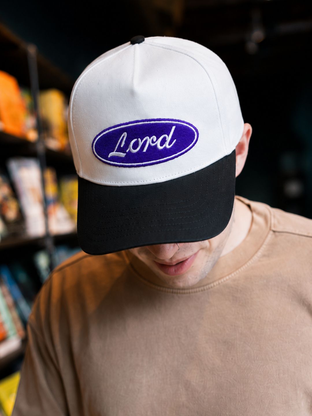 "Lord" on White Cap with Black Bill