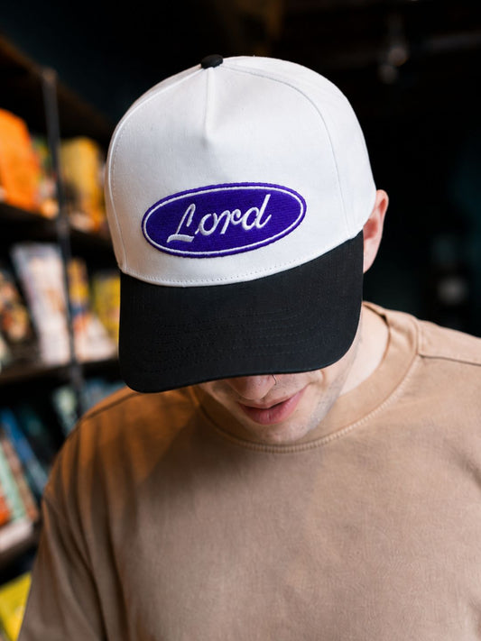 "Lord" on White Cap with Black Bill