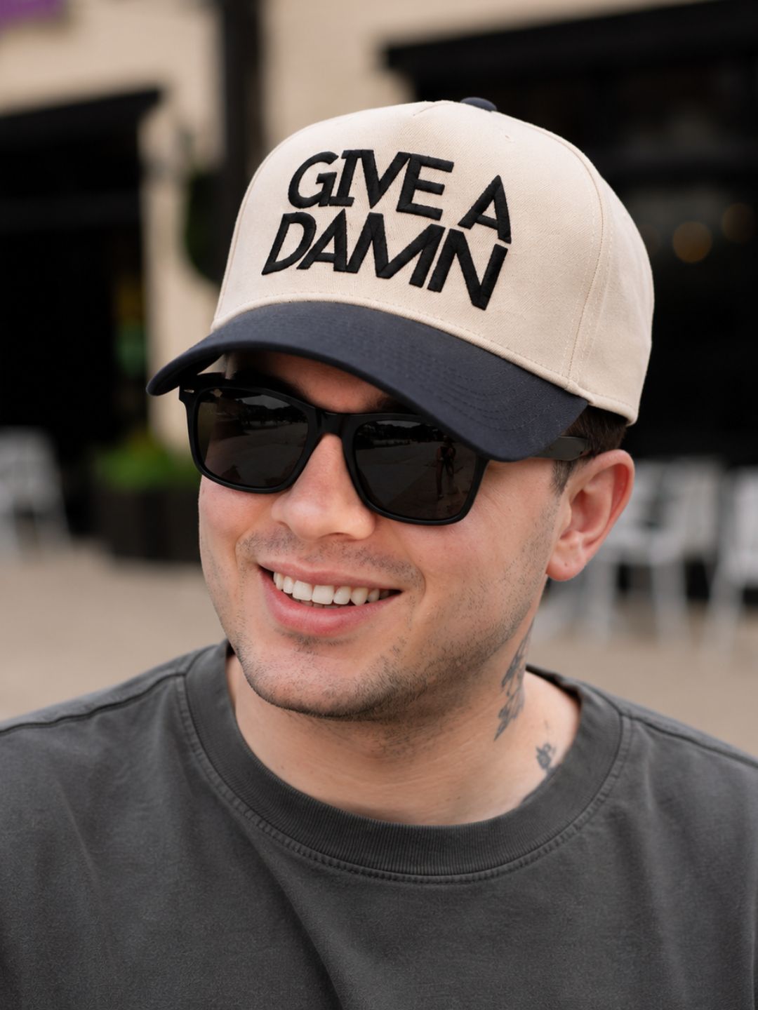 "Give a Damn" on Tan Cap with Black Bill