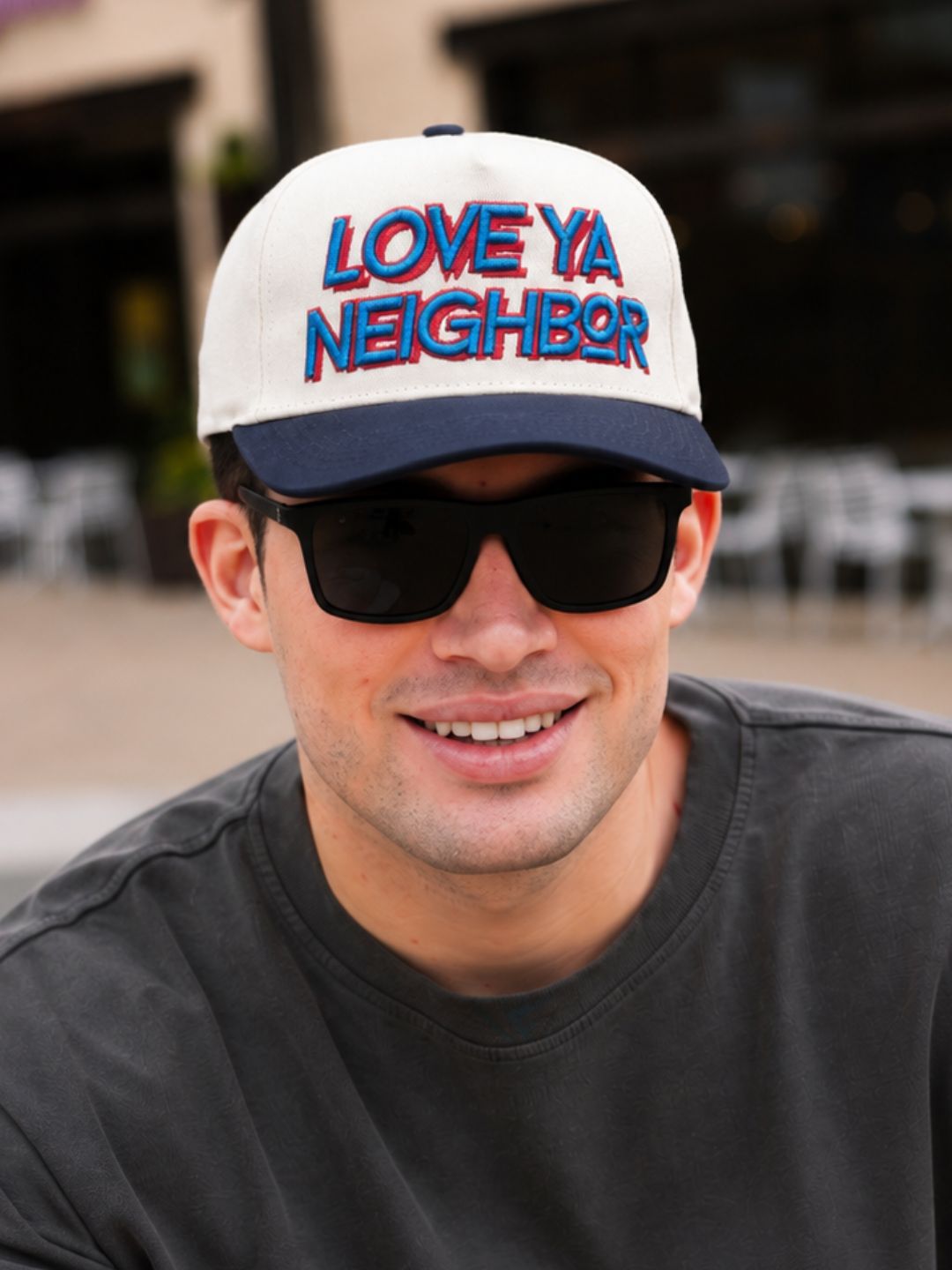"Love Ya Neighbor" on Tan Cap with Navy Bill