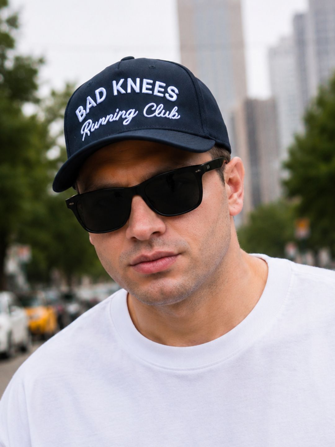 "Bad Knees Running Club" on Black Cap